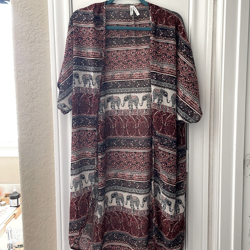 Boho, flowy cardigan in size large. Though it fits more like a medium.